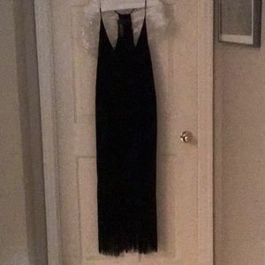 Stunning Holiday black fringe dress cascades from the waist down